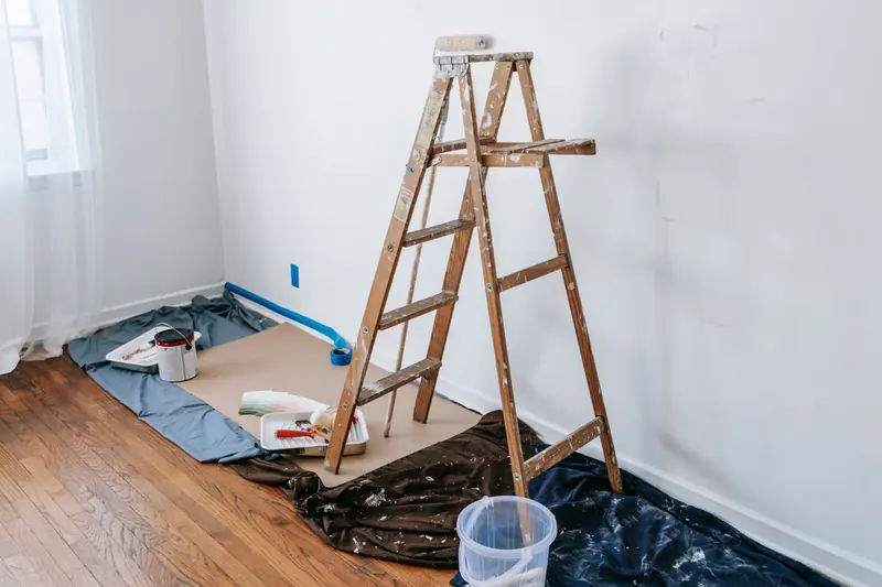 Rental turnover painting in Fremont: empty unit with fresh white walls and a stepladder